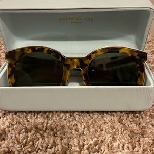 Karen walker super spaceship sunglasses.